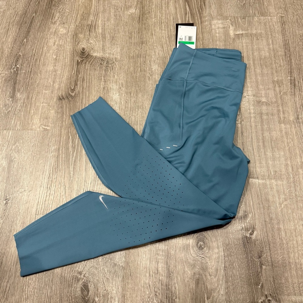 Nike Swift women’s size XL Teal Athletic Leggings
